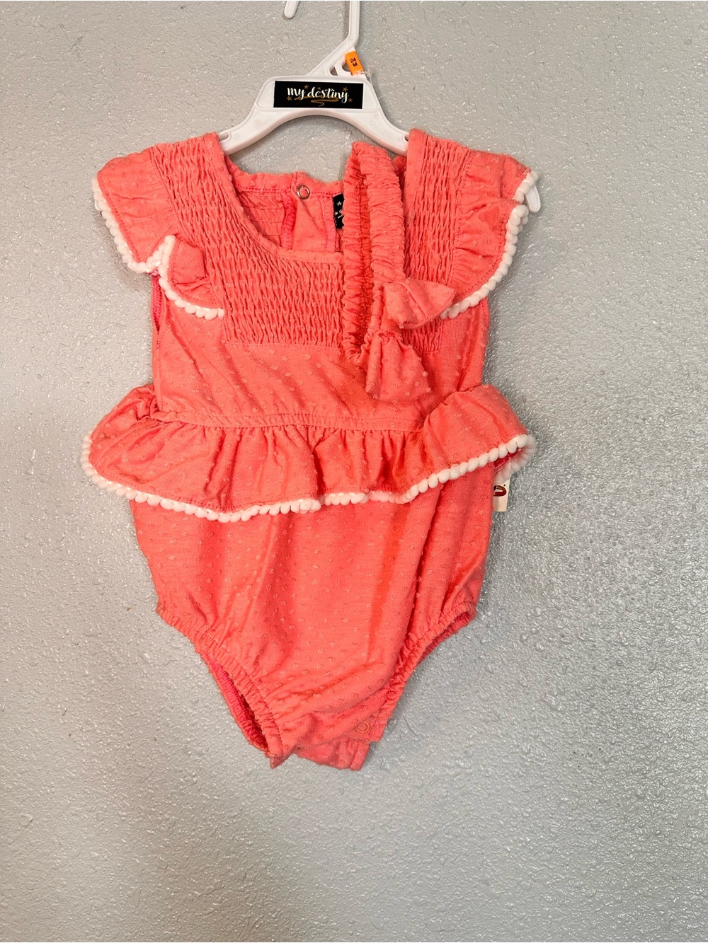 Coral Ruffle Baby Bodysuit with Pom Trim